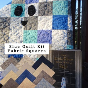 May include: A quilt featuring a ghost design in shades of blue, white, and gray, accompanied by a stack of assorted blue and tan fabric squares and a book titled The Little Ghost Who Was a Quilt. The text Blue Quilt Kit Fabric Squares is visible.