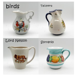 Vintage creamer/pitcher, El Carmen Froilam Tacavera Spain, Japan bird pitcher, Lord Nelson lion cub England pitcher, Sorrerio Pitcher Italy