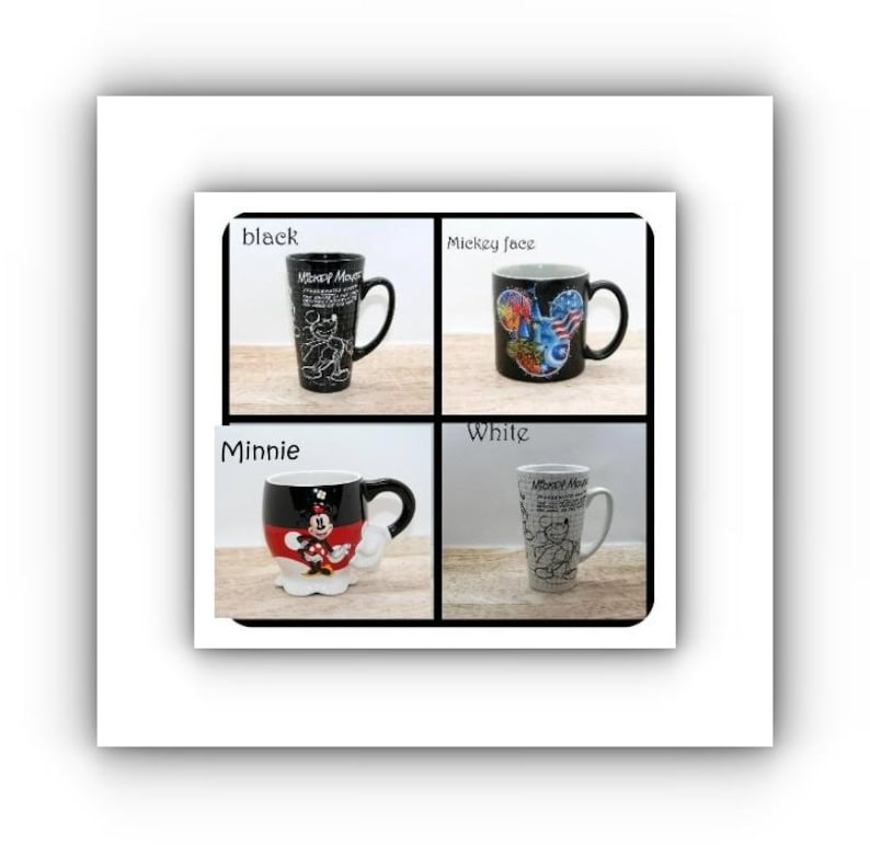 May include: Four different coffee mugs are displayed. One is black with a white Mickey Mouse design, another is black with a colorful Mickey face design, a third is a Minnie Mouse mug, and the last is a white mug with a Mickey Mouse design.