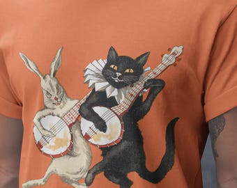 Camiseta de banjo con gato y conejo, camiseta de animal caprichoso, banjo con gato negro, camiseta musical, camiseta de arte vintage, camiseta vintage de Halloween, regalo para amantes de los gatos