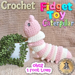 May include: A handmade crochet caterpillar fidget toy in pink and white. The toy is over 1 foot long and has a smiling face. The image includes the text "Crochet Fidget Toy Caterpillar".