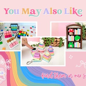 May include: A pink background with the text "You May Also Like" and "find them in our shop!". The image features miniature items, including colourful cube-shaped cases, stacks of books, and a bookshelf with miniature books and a frog.