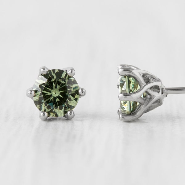 Natural Green Sapphire stud earrings, available in titanium, white gold and surgical steel 4mm & 5mm sizes