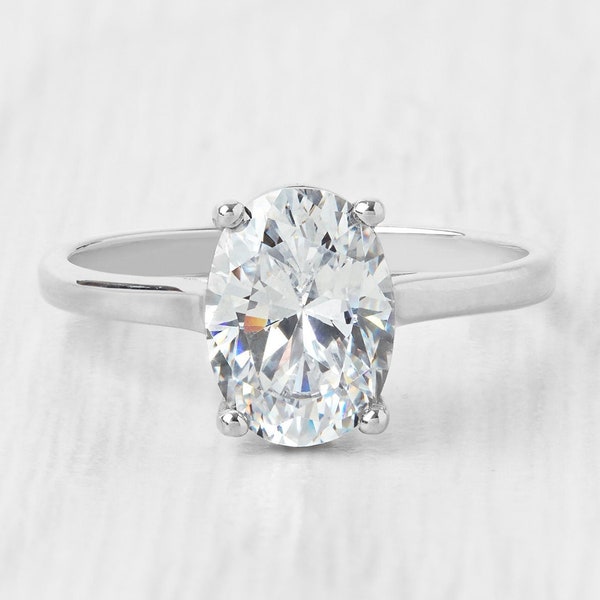 1.7ct Oval Cut Solitaire cathedral ring in Titanium or White Gold - Simulated diamond