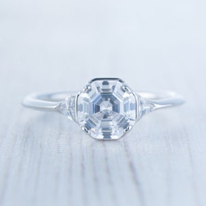 Man made diamond octagon & Trillion solitaire engagement ring available in Sterling Silver and White Gold Filled