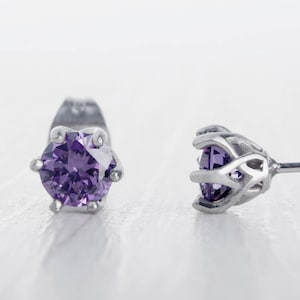 Natural Amethyst stud earrings, available in titanium, white gold and surgical steel 4mm amd 5mm sizes