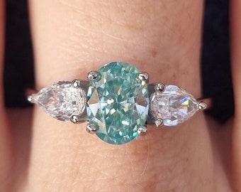 Teal and White Genuine moissanite Oval & pear cut 3 stone Trilogy Ring in White Gold or Titanium  - engagement ring - handmade ring