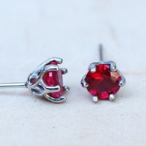 Natural Ruby stud earrings, available in titanium, white gold and surgical steel 4mm or 5mm sizes