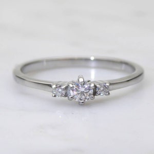 Genuine moissanite 3 stone Trilogy Ring in White Gold or Titanium  - engagement ring - handmade ring