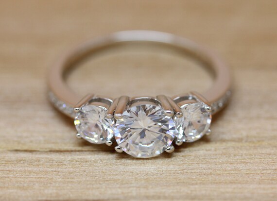Moissanite trilogy ring deals