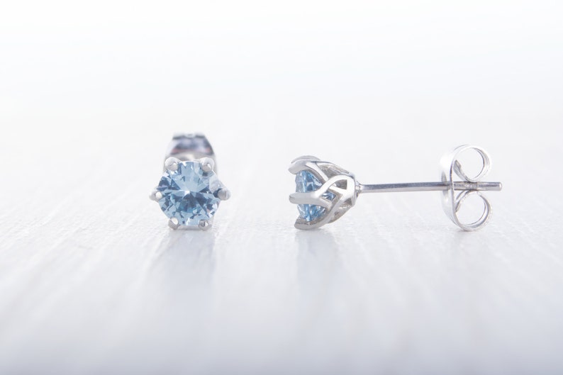 Natural Aquamarine stud earrings, available in titanium, white gold and surgical steel 4mm or 5mm sizes 