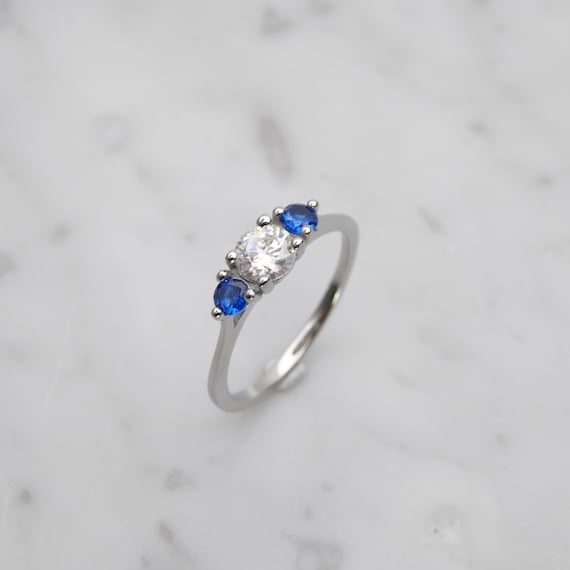 Genuine moissanite Lab Blue sapphire stone Trilogy Ring in White Gold  or Titanium engagement ring handmade ring