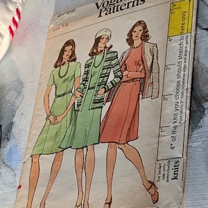 May include: Vintage Vogue sewing pattern for a dress and jacket. The pattern is for size 14 and is made for knit fabrics. The pattern shows three women wearing the dress and jacket in different colors. The pattern is titled "Vogue Patterns" and has a price of $2.50.