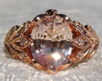 GIA Certified 2.6 Carat Peach Ceylon Untreated Oval Sapphire in Freesia Rose Gold Engagement Ring