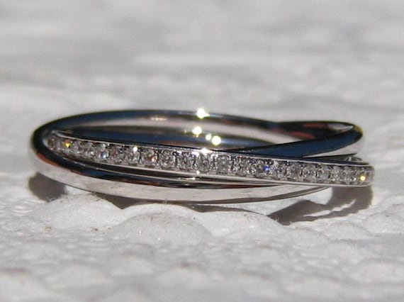 White gold rolling best sale ring