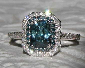 Reserved... 1.47 Carat Untreated Blue Green Montana Sapphire and Blue Diamonds in White Gold Diamond Double Halo Engagement Ring