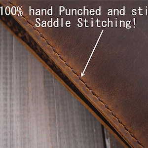 May include: Close-up of a brown leather item with visible saddle stitching. The text in the image reads "100% hand Punched and stitched Saddle Stitching!" The leather has a distressed appearance, with variations in color and texture.