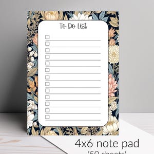 May include: A floral to-do list notepad with a black background and colorful flowers. The notepad is 4x6 inches and has 50 sheets.