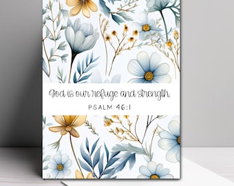 May include: A rectangular greeting card featuring a floral pattern of light blue and golden yellow flowers on a white background. A central white horizontal band displays the black text: God is our refuge and strength. PSALM 46:1.