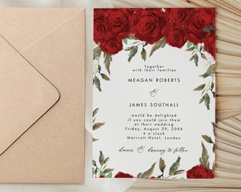May include: A wedding invitation card and a matching kraft paper envelope. The card features a white background with a border of deep red roses and green leaves. The text reads: Together with their families MEAGAN ROBERTS & JAMES SOUTHALL would be delighted if you could join them at their wedding Friday, August 29, 20XX 4 o'clock Marriott Hotel, London dinner & dancing to follow.