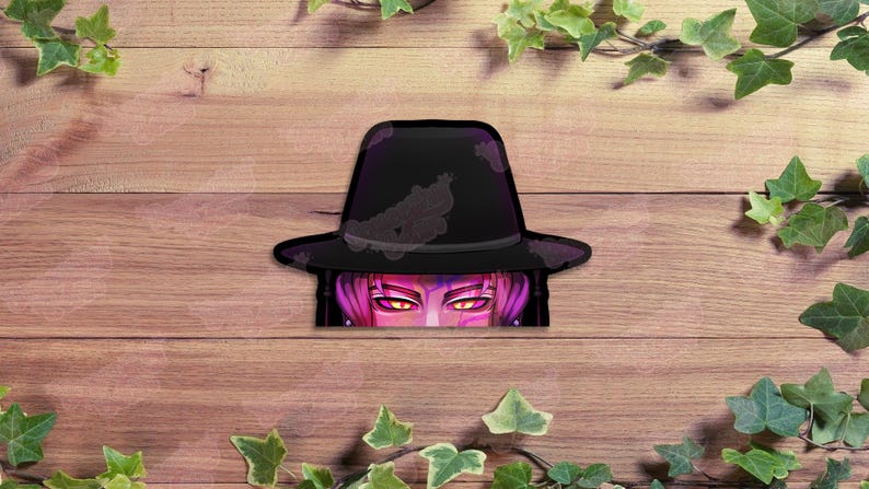 May include: A black fedora-style hat with a purple brim and a decorative pattern. The hat partially obscures a face with pink hair and glowing yellow eyes. The image is set against a wooden background with green ivy.