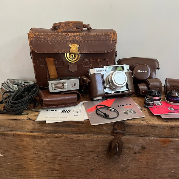 Vintage Ricoh 500 Rangefinder Camera with Auxiliary Lens Set, Manuals, Case, Kano 818 Flash