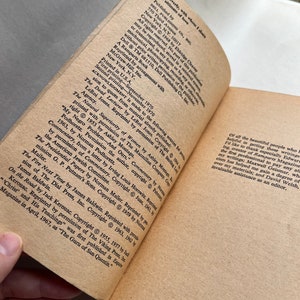 May include: A close-up of a book with a brown cover and white text. The title of the book is "Soul on Ice" by Eldridge Cleaver. The book is about the author's experiences in prison and his views on race and society.