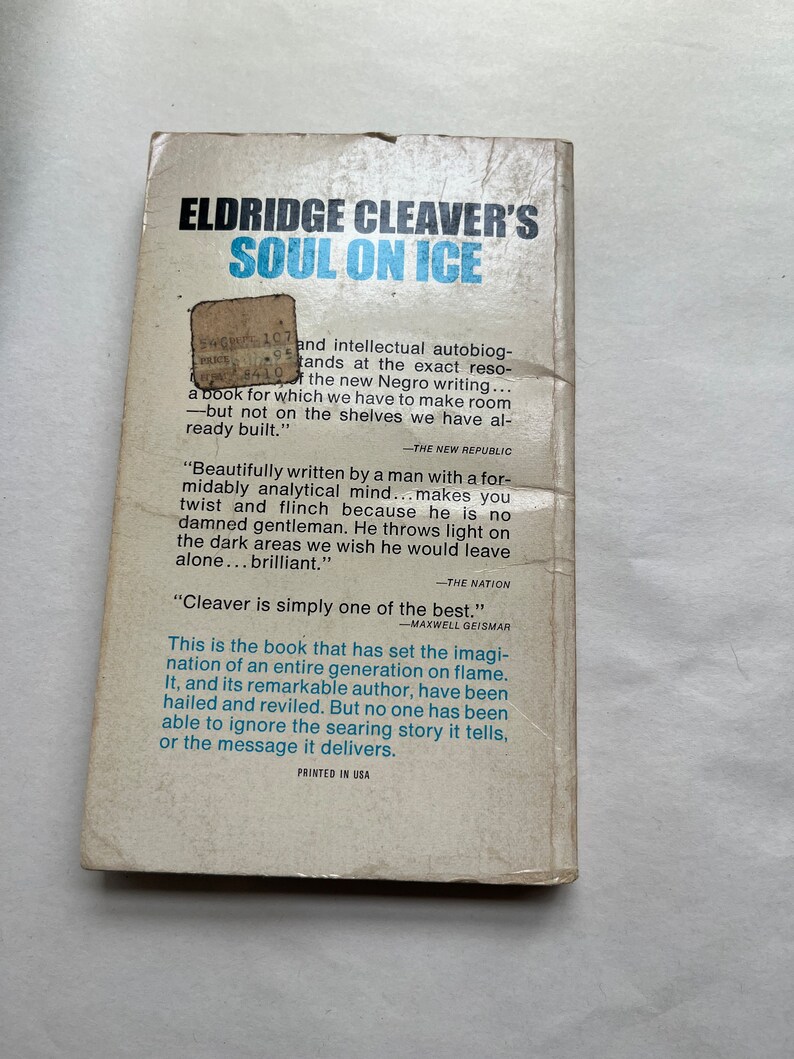 May include: A book cover with a blue and white title "Soul on Ice" by Eldridge Cleaver. The cover features a quote from The New Republic, "Beautifully written by a man with a formidably analytical mind...makes you twist and flinch because he is no damned gentleman. He throws light on the dark areas we wish he would leave alone...brilliant."