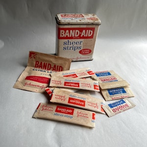 Vintage Johnson & Johnson Band Aid Brand Sheer Strips Metal Tin with Bandages
