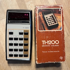 Vintage Texas Instruments TI-1200 Calculator in Original Box