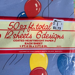 May include: A pack of 12 sheets of blue, yellow, and red balloon patterned wrapping paper. The pack says "50 sq. ft. total 12 sheets 6 designs" and "COATED HEAVYWEIGHT PAPER EACH SHEET 1 FT. 8 IN. x 2 FT. 6 IN."