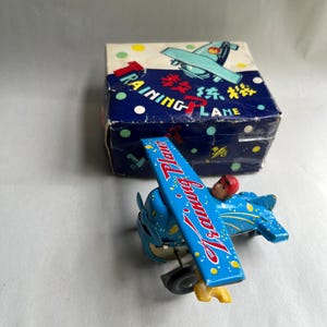 Vintage Blue Wind Up Tin Toy Training Plane Airplane MS-011