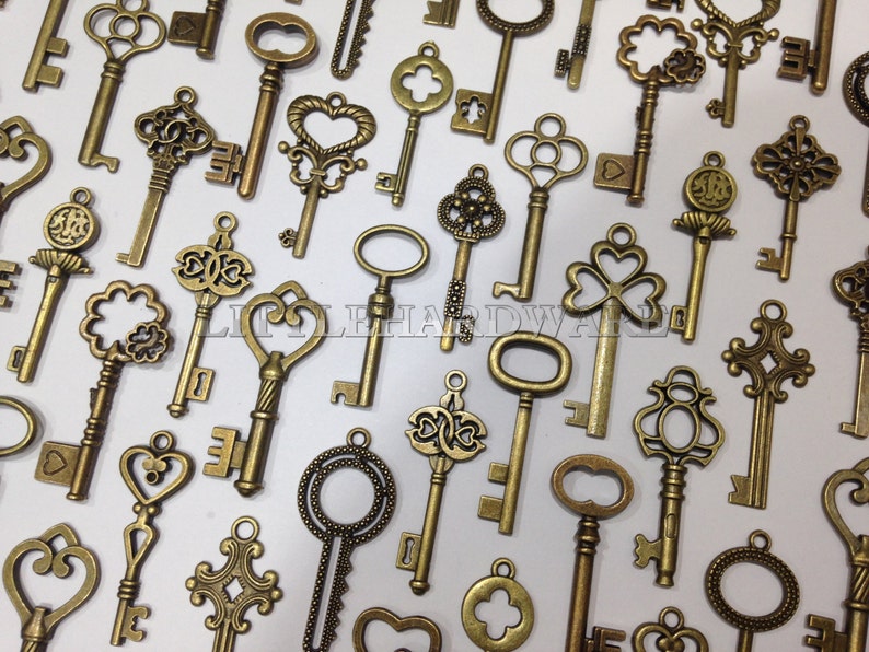 100pcs vintage crown keys, antique skeleton keys , pendant heart Wedding decorations,wedding favors, christmas tree decorations VK0055 image 1