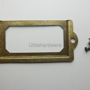 10 porta carte/porta etichette/cornici per etichette color bronzo 70 mm x 34 mm DP0105
