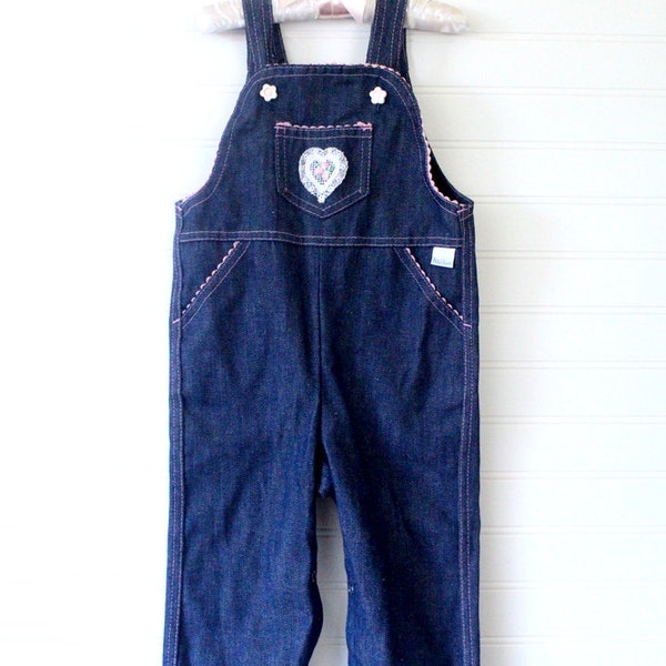 Vintage baby overalls. Blue jean overalls with lace heart detailing the chest. Pete's Jeans sz 24 mo