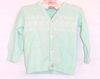 Vintage baby sweater, green knit with 4 pearly buttons up the front, Golden Gate size about 3-6 months