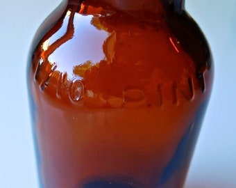 1/10 Pint Brown Vintage Bottle Made in Taiwan.