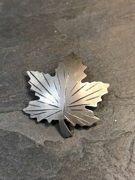 Vintage gold over sterling silver maple leaf shape