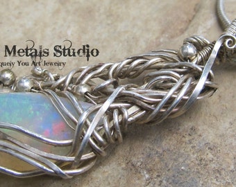 Elvish Delight Ethiopian opal and sterling silver wire wrapped pendant P0031