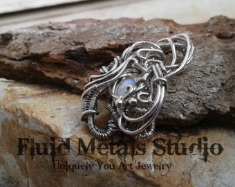 Heady sterling silver Ethiopian opal wire wrap pendant DA0024