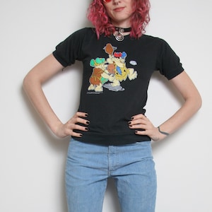 Vintage Flintstones Shirt - 90er Jahre Grafik T-Shirt Größe S - 50 50 - Baby T-Shirt - Vintage schwarzes T-Shirt - Fred und Barney - Baseballshirt