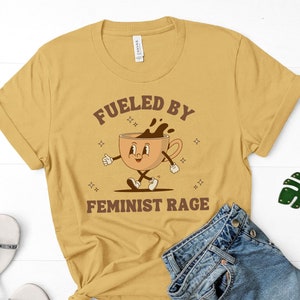 Fueled by Coffee and Feminist Rage 70s Cute feminist tshirt retro feminism activist apparel gift shirt t-shirt funny march activism image 1