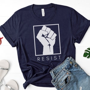 RESIST Feminist shirt, Resist shirt, Raised fist shirt, Protest, Resistance, activism, gift for him, gift for her, liberal shirt