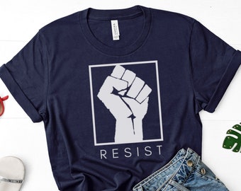 RESIST Feminist shirt, Resist shirt, Raised fist shirt, Protest, Resistance, activism, gift for him, gift for her, liberal shirt