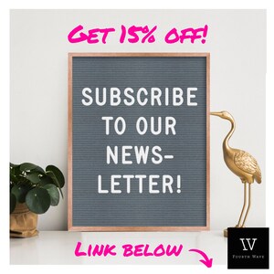 May include: A gray letter board with the text "SUBSCRIBE TO OUR NEWS-LETTER!" and the words "LINK BELOW" written in pink. A gold bird figurine is on the right side of the board. The text "IV FOURTH WAVE" is in the bottom right corner.