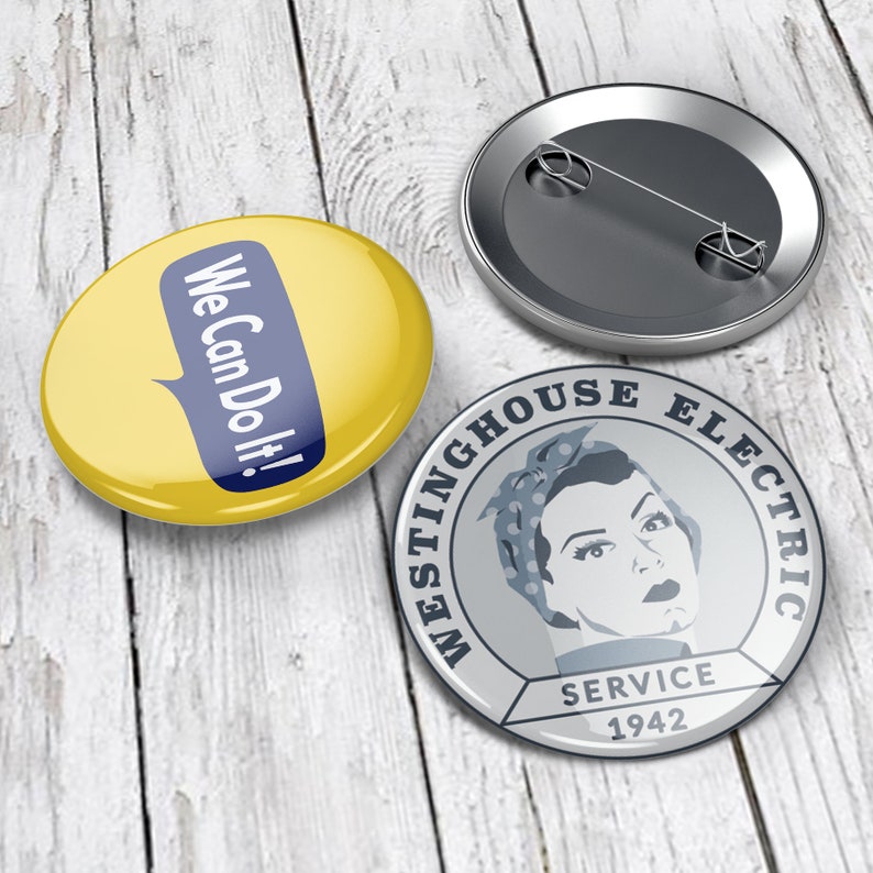 May include: Two round pinback buttons. One button is yellow with a blue speech bubble that says "We Can Do It!" The other button is silver with a black and white image of a woman in a headscarf and the text "Westinghouse Electric Service 1942".
