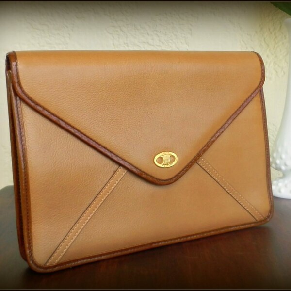 REDUCED *+*+ Vintage CELINE ENVELOPe Clutch, ORlGlNAL B0X w/Tag Cognac Browns, Gold CELlNE logo, Made Italy. Brand New, Never Enjoyed Purse.