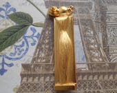 Givenchy Organza goldtone brooch. Figural brooch in the shape of the Organza perfume bottle.