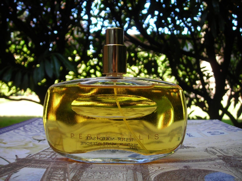 bottle of Perry Ellis for women 1.7 oz GOLD MINE PERFUME FOR WOMEN 3.3 OZ