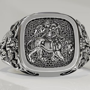 Cupid riding on a lion signet ring made of Sterling Silver.